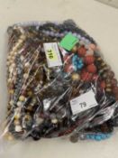 A quantity of mixed hardstone and other bead jewellery to include tigers eye, garnets, amber,