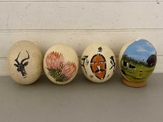 Four painted Ostrich eggs