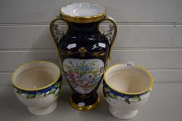 Gilt decorated double handled vase together with a pair of floral jardinieres (3)