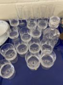 A collection of Wedgwood clear drinking glasses, decanter and others