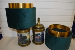 Pair of modern metal based table lamps decorated with horses