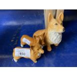 Two Beswick model Corgi's and one other