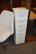 Narrow floral painted seven drawer chest