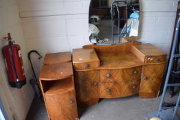 Walnut veneered serpentine front dressing chest and pair of bedside cabinets