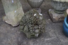 Concrete garden ornament formed as a bowl of fruit