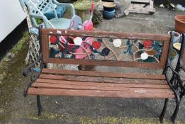 Iron and wood framed garden bench, 126cm wide