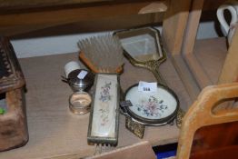 Early 20th Century needlework and gilt metal dressing table set