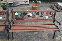 Iron and wood framed garden bench, 126cm wide