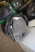 Bag of various assorted clothes
