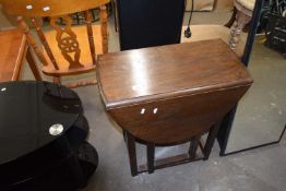 Small oak drop leaf table on barley twist legs