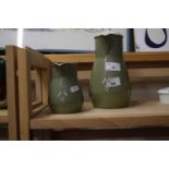 Wedgwood moss green hot water jug and a further smaller jug