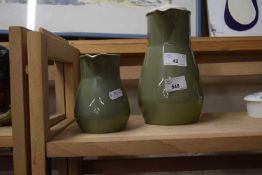 Wedgwood moss green hot water jug and a further smaller jug