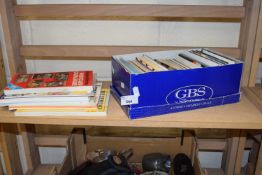 Quantity of assorted postcards and books on postcard collecting