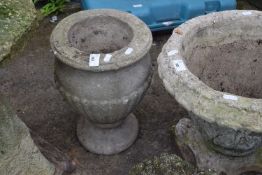 Small concrete urn