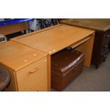 Light wood office desk and accompanying filing cabinet (2)