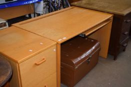 Light wood office desk and accompanying filing cabinet (2)