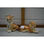 Two Russian pottery model lion cubs