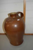 Large brown glazed jar marked Sturton & Son