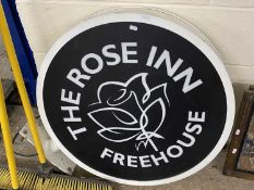 An illuminated sign The Rose Inn Freehouse