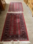 Near pair of modern Middle Eastern wool floor rugs, largest 155cm long (2)
