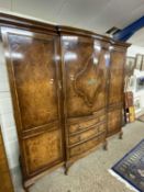 Waring & Gillows burr walnut veneered wardrobe of large proportions with two central doors over