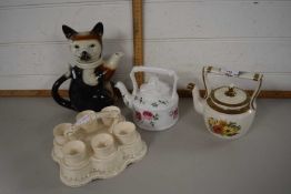 Egg cruet together with three novelty teapots