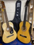 A Kay G101 acoustic guitar together with a Bon Play guitar