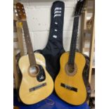 A Kay G101 acoustic guitar together with a Bon Play guitar