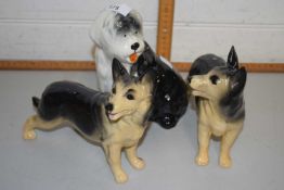 Mixed Lot: Three pottery dogs