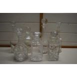 Collection of various clear glass decanters