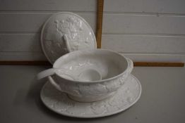 An Italian soup tureen and stand