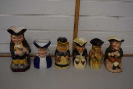 Six various assorted character jugs