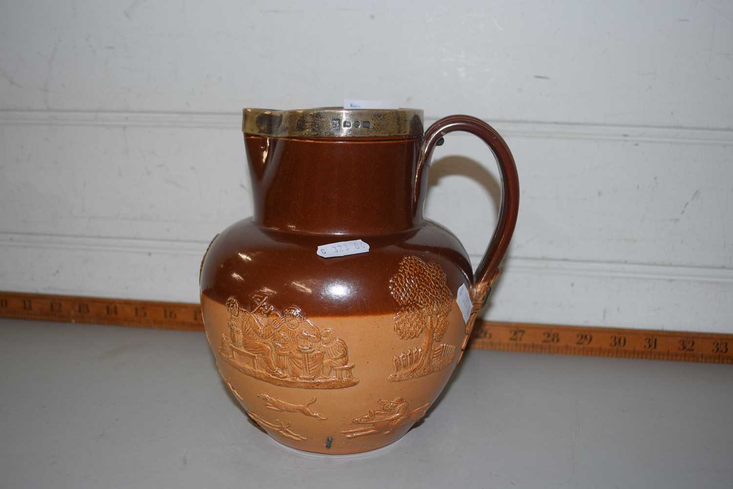 Doulton stone ware jug with silver rim (a/f)