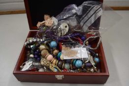 Wooden jewellery box and a quantity of costume jewellery to include bead necklaces, chains etc