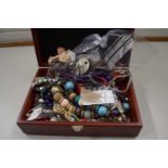 Wooden jewellery box and a quantity of costume jewellery to include bead necklaces, chains etc