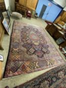 Large 20th Century wool rug decorated with a central geometric panel on a principally blue