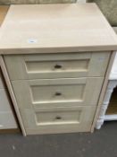 Light wood finish three drawer bedside chest