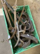 Box of vintage horse hames, leather straps etc
