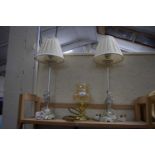 Pair of table lamps with cream shades together with a brass effect and glass lamp (3)