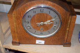 An Enfield dome topped wooden mantel clock