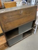 Retro narrow bureau with sliding glass doors to the base