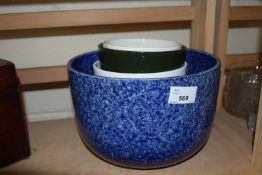 Blue speckled dish together with another smaller and assorted plant pots