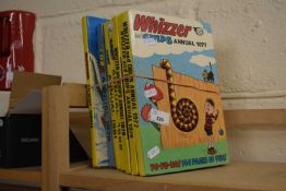 Eight assorted children's annuals to include Whizzer & Chips, Buster etc