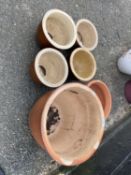 Six various terracotta and ceramic garden pots