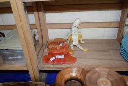 Three children's wooden jigsaws together with a novelty model of a banana