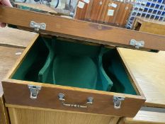 Wooden case with green baize lining