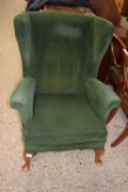 Early 20th Century green upholstered wing back armchair