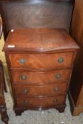 Reproduction serpentine front mahogany veneered chest of drawers, 47cm wide