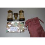 Mother of pearl card case and a mother of pearl and brass pair of opera glasses