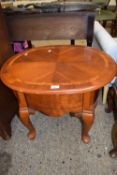 Reproduction oval topped coffee table